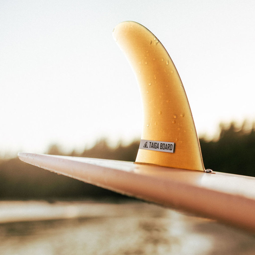 Fin View of The Longboard Surf Board in The Rosé Color
