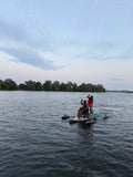 2 Paddlers On The Adaptive SUP