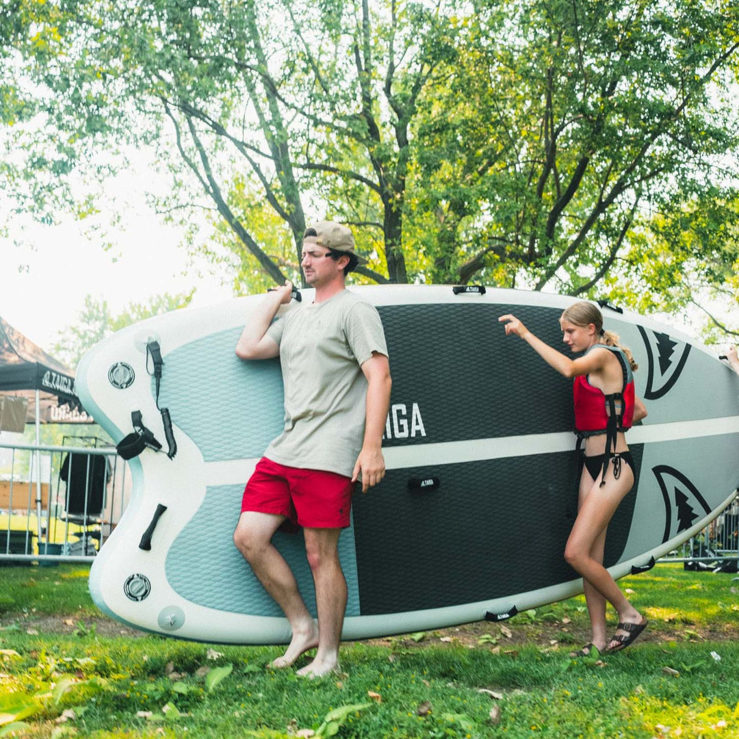 Paddlers transporting the Sequoia Air 13'6" Light Construction