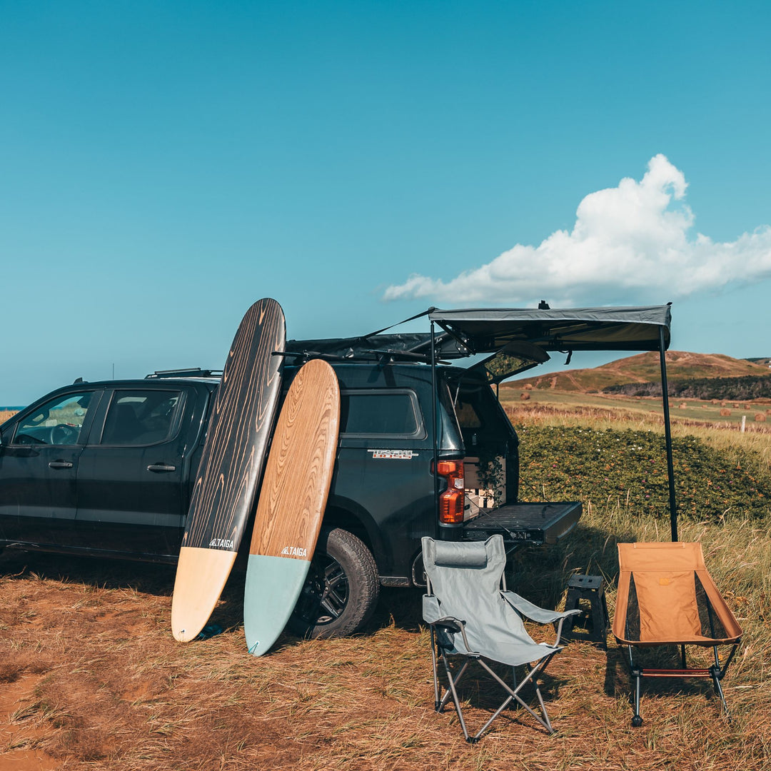 Malibu 7'2" Surf Board Leaning on a Camping VAN 
