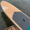 Nose View of The Tundra 11'6" in Color Teal On a Dock