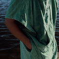 Changing towel close-up with water background