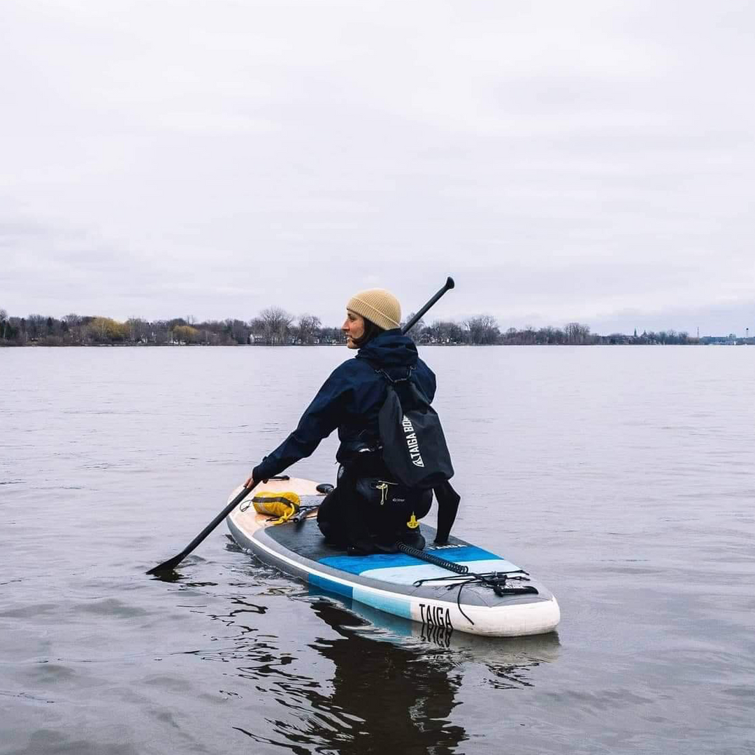Paddler with the 20 L DRY BAG by TAIGA - Black